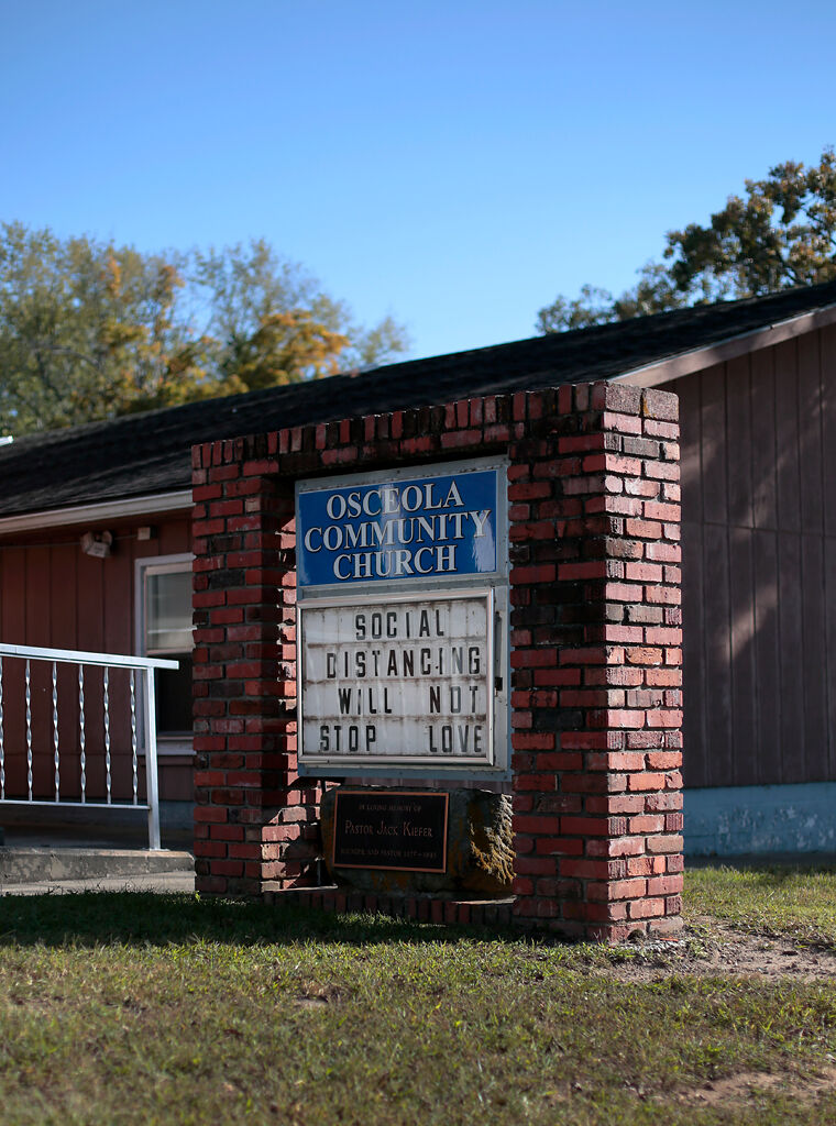 A church sign with the phrase, “social distancing will not stop love” sits in front of the Osceola Community Church on Friday, Oct. 2, in Osceola, Mo.